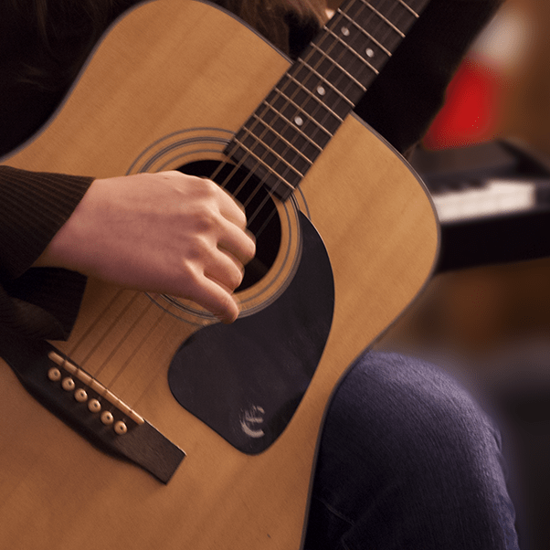 Best Music Lessons Near Me – Best Guitar Lessons – Acoustic Guitarist