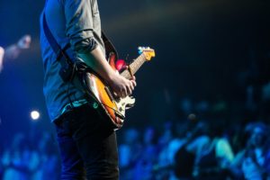 How to Tune the Classic Rock Open G Sound Using Harmonics - Guitarist Playing in Concert - How Do I Organize a Recital Concert