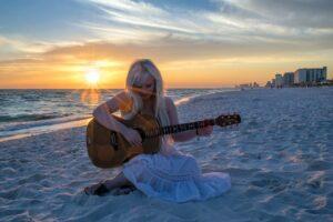 What is Required of Me to Write a Good Song if I Have no Experience with Songwriting - Girl Playing Guitar on Beach - Positives to Dyslexia - Everything is Connected to Everything - How to Write a Song with a Catchy Chorus (Including Lyrics)