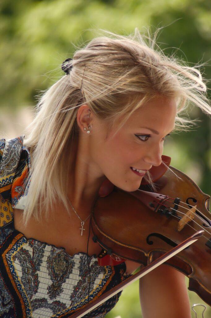 What Is Your Definition of a Good Musician - Woman Playing Violin