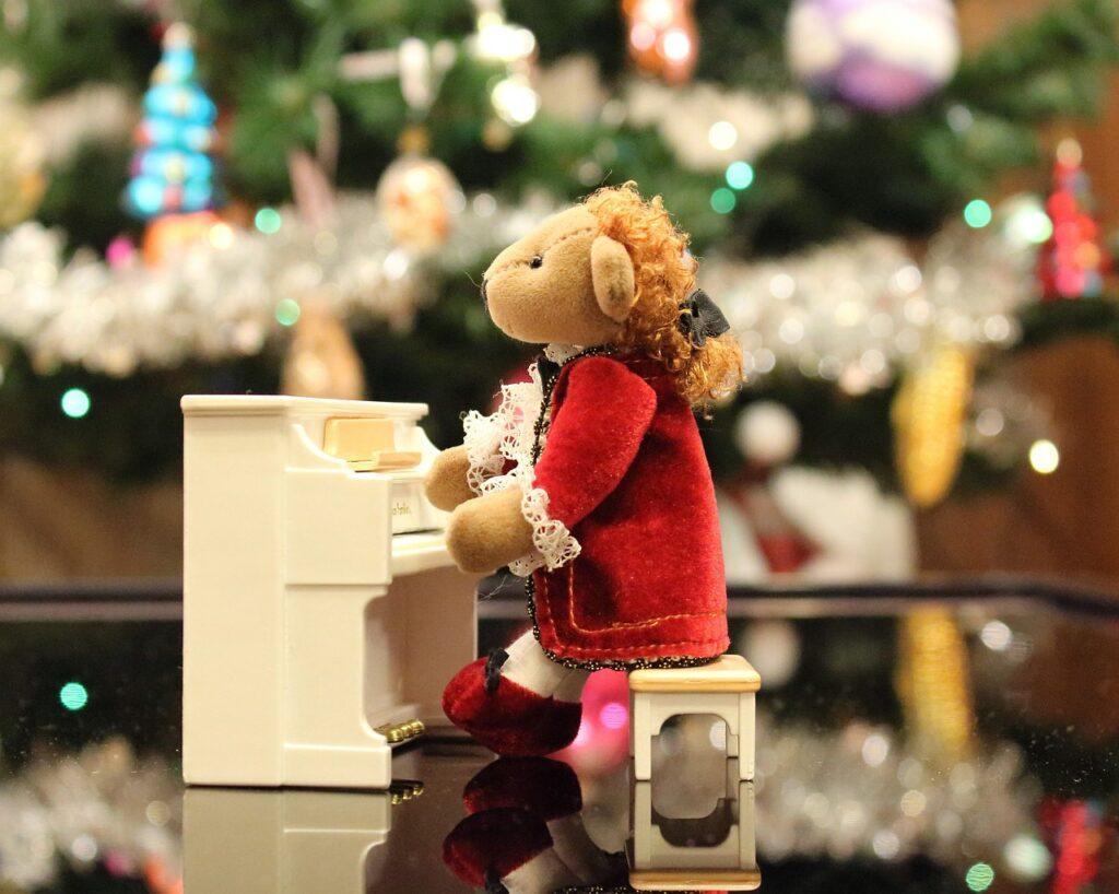 Angels We Have Heard on High - A Powerful Carol of Joy [Words] - Christmas Bear Playing Piano