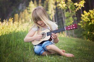 What Is the Precise Meaning of Scaffolding in Teaching - Girl Playing Guitar