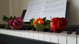 How to Read Piano Sheet Music for Beginners - Piano with Sheet Music and Roses