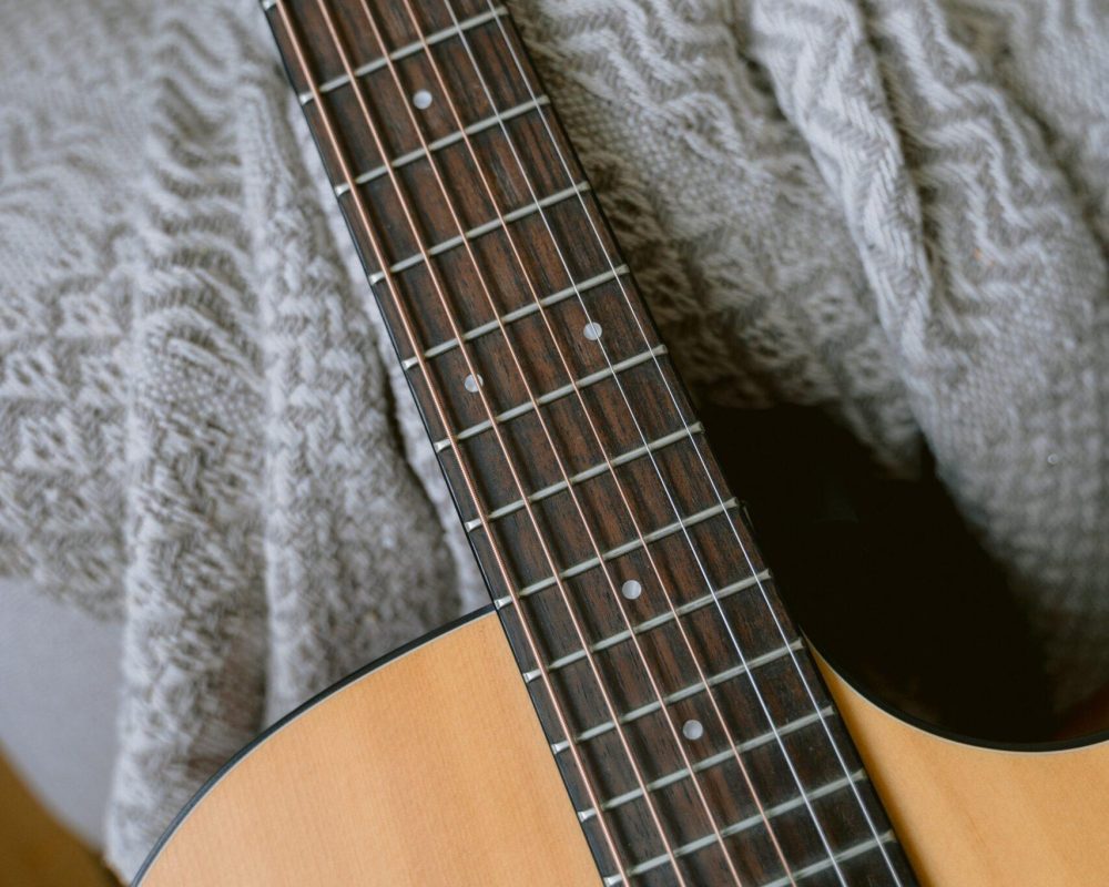 7 Songwriting Templates to Get Your Ideas Flowing - Acoustic Guitar with Capo
