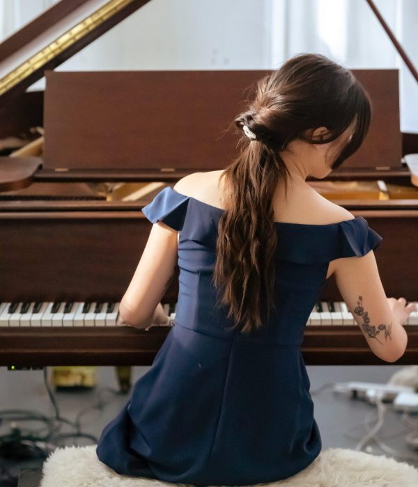 How does your brain learn to play the piano with two hands - Changing Keys in Your Songwriting - Young Woman Playing the Piano - The Top 5 Best Drake Sheet Music Gift Ideas