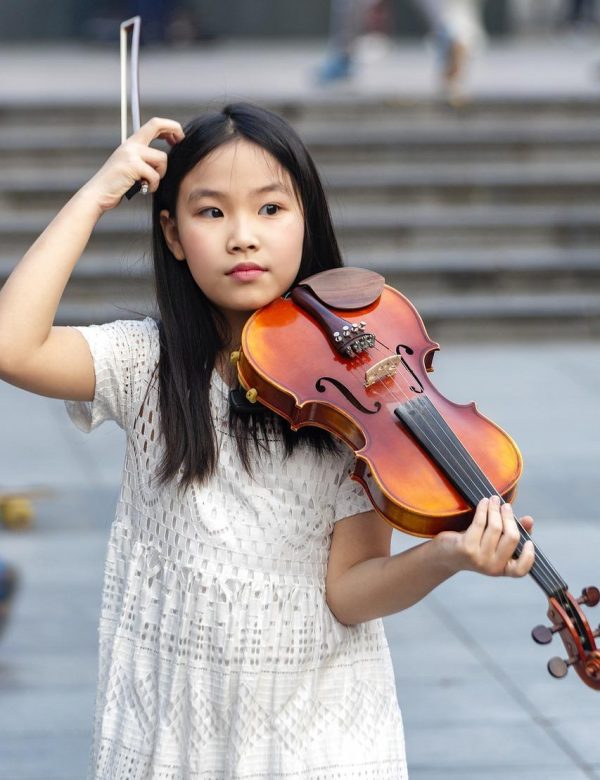 Do People with ADHD Have Difficulty Playing from Sheet Music - Girl with Violin - Prodigy Meaning: Examples of Special Talent in Music [Video]