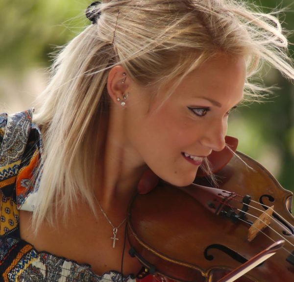 What Is Your Definition of a Good Musician - Woman Playing Violin