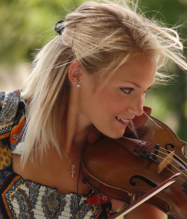 What Is Your Definition of a Good Musician - Woman Playing Violin